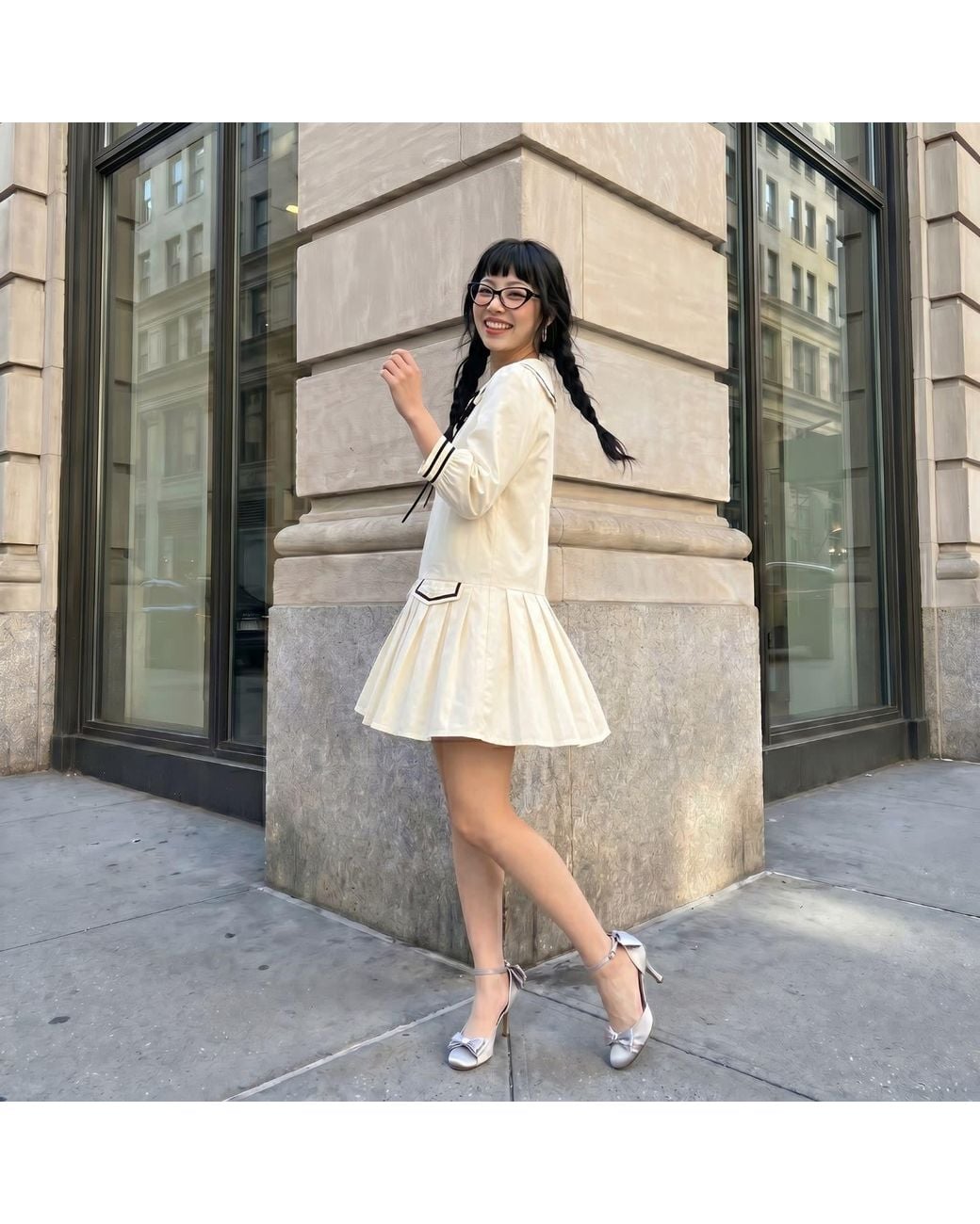 Modenaire Natural Neutrals Long Sleeve Mini Dress With Peter Pan Collar Front Tie Detail Contrast Trim Pockets And Soft Pleated Skirt