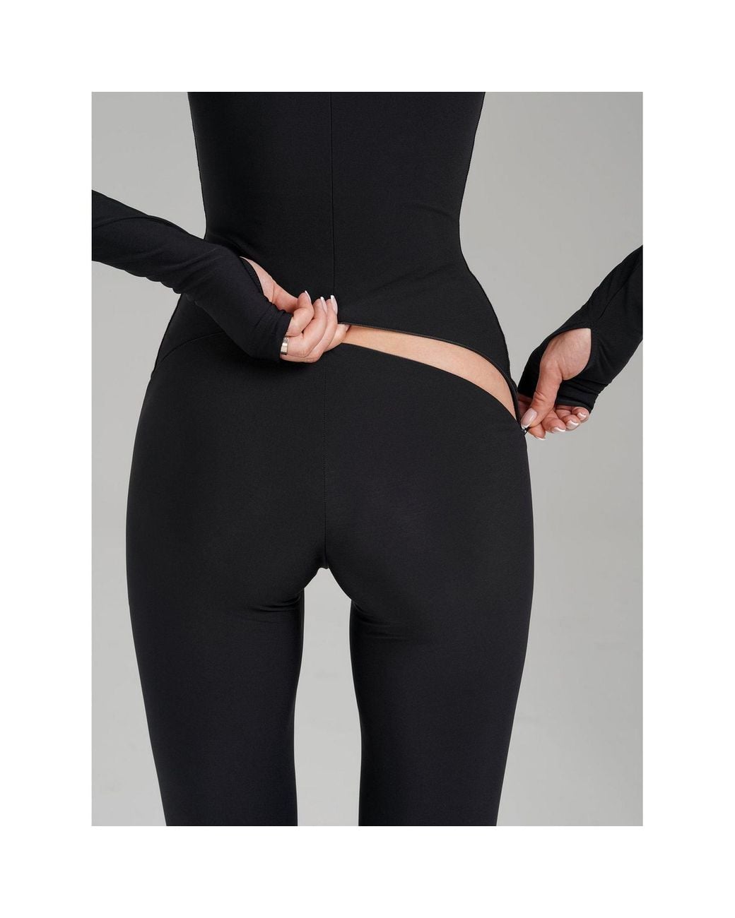 Monosuit Black Ribbed Bootcut Flared-Leg Jumpsuit