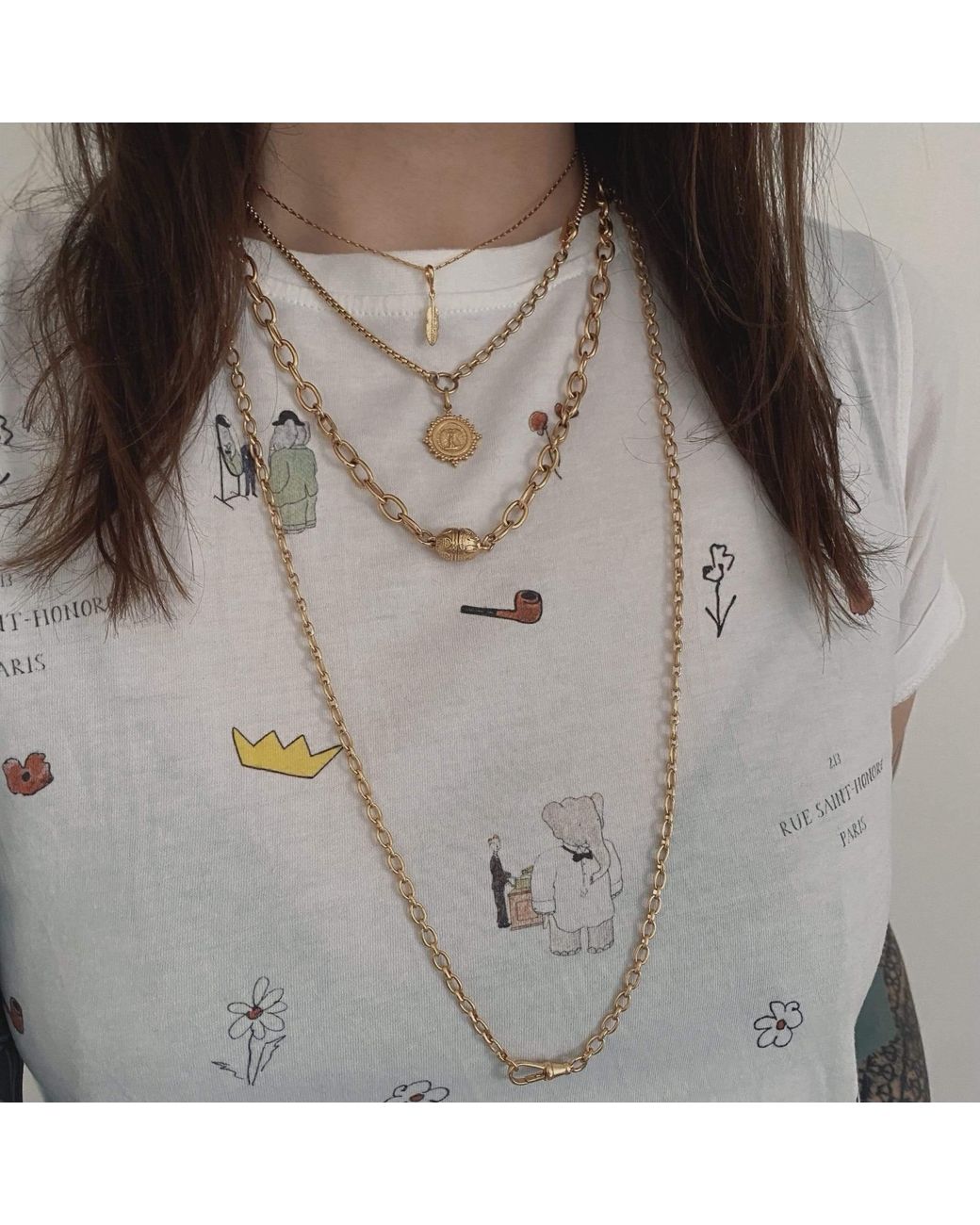 IN CAUDA VENENUM Metallic Lakshmi Necklace