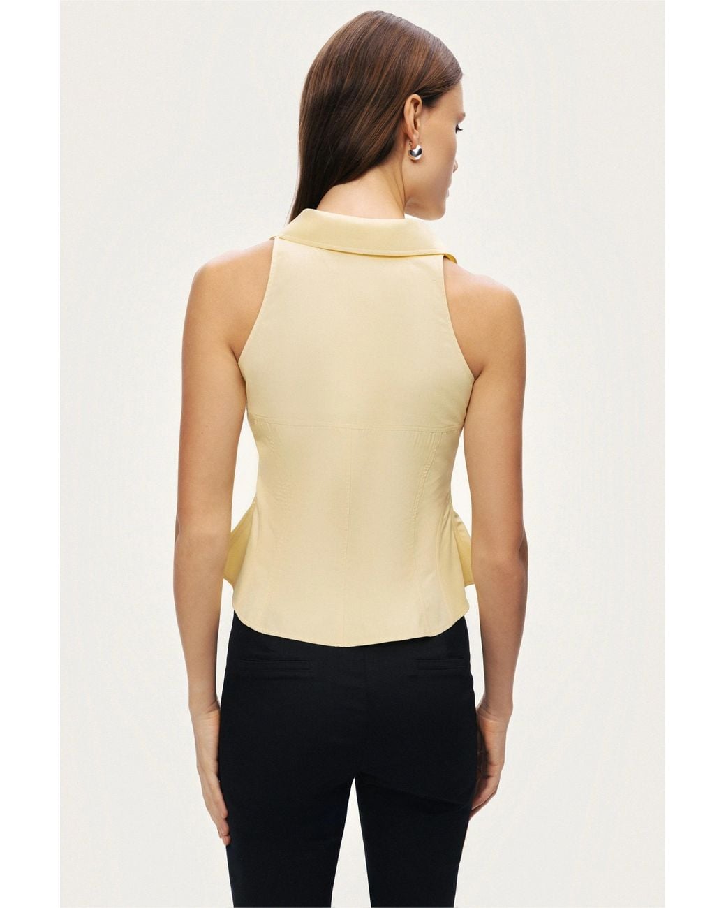 Nocturne White Sleeveless Sculpted Shirt