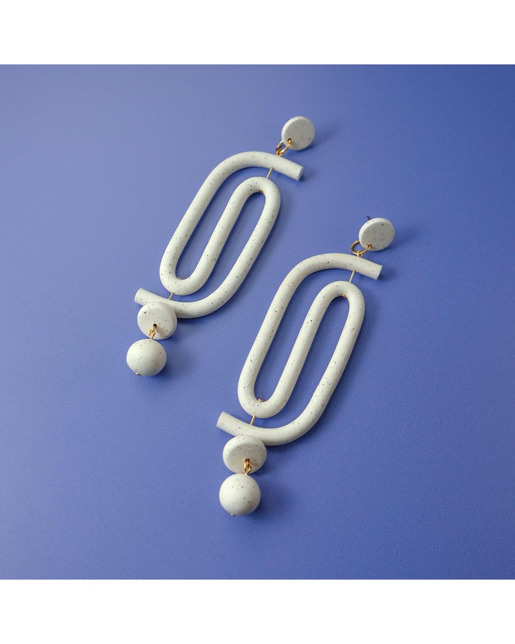 By Chavelli White Labyrinth Dangly Statement Earrings