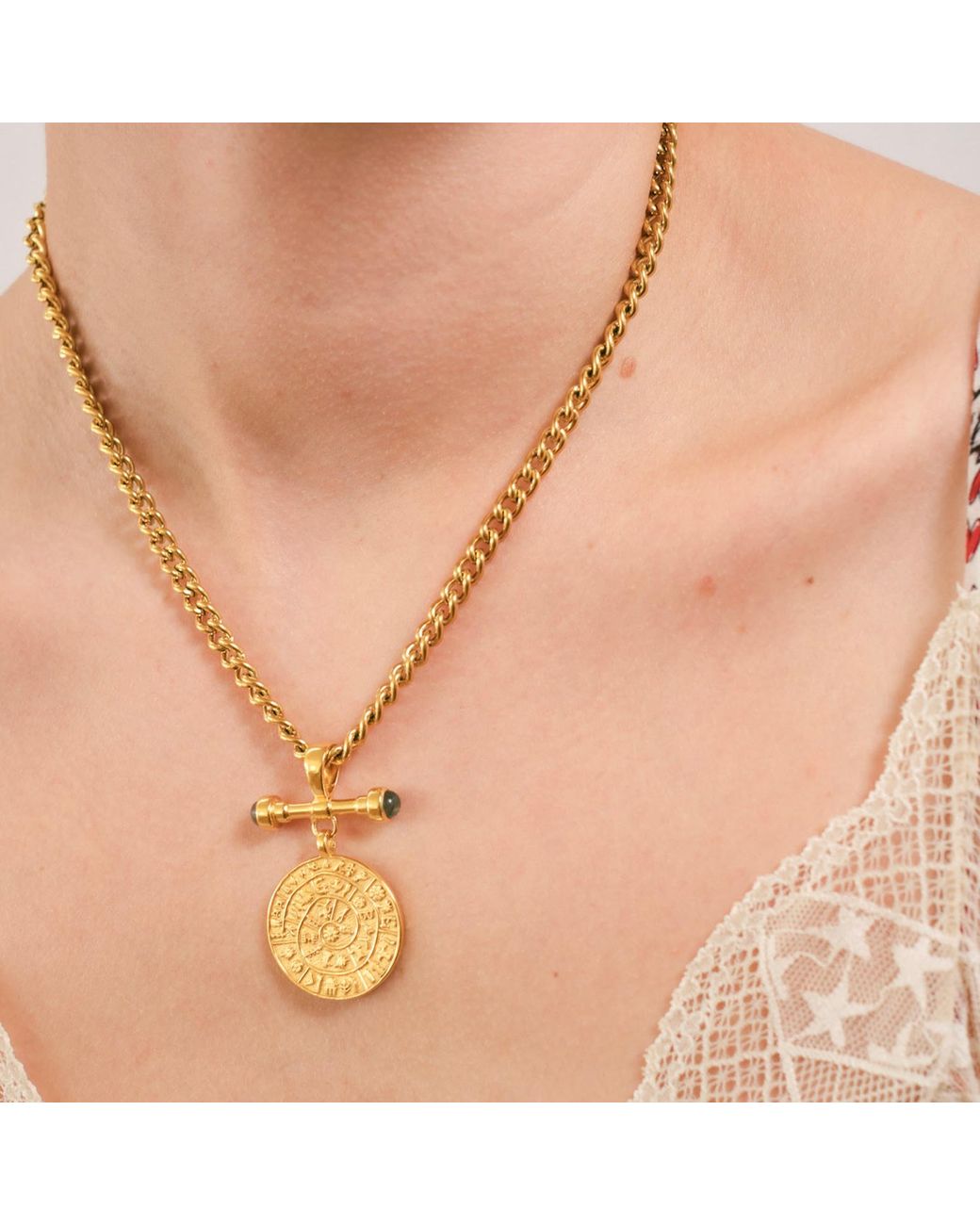Isolated Jewellery Metallic Phaistos Disc