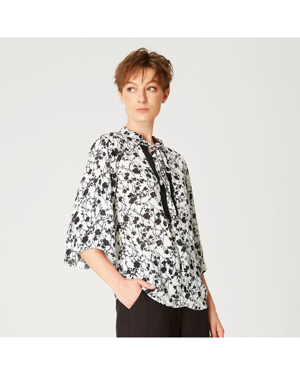 Smart and Joy Black Tulip Sleeves Blouse With Monochrome Floral Print