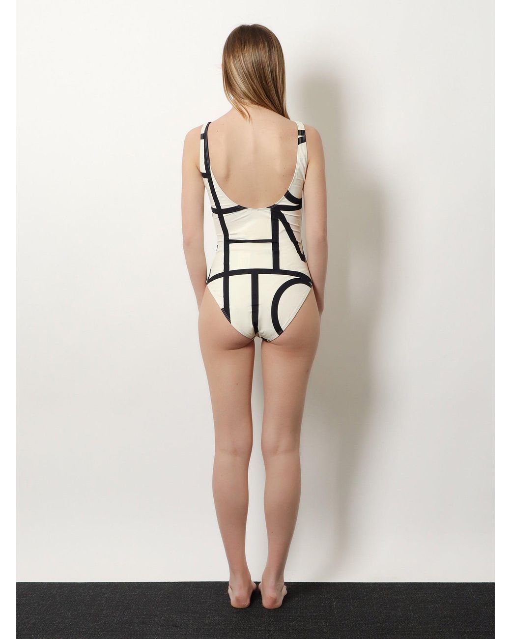 Totême White One-Piece Swimsuit With Monogram Print