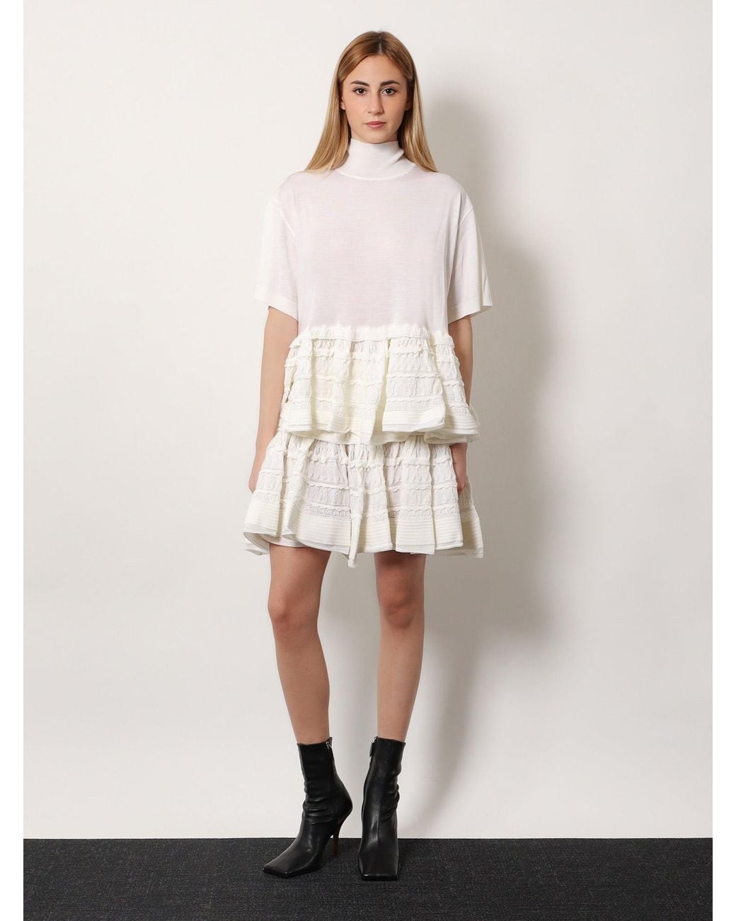Alaïa White Peplum Virgin Wool Sweater