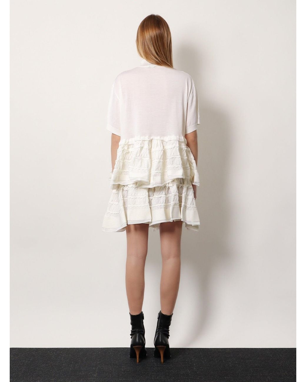 Alaïa White Peplum Virgin Wool Sweater