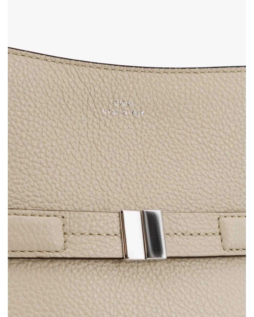 Totême Natural Hammered Leather Bucket Bag With Strap On The Front