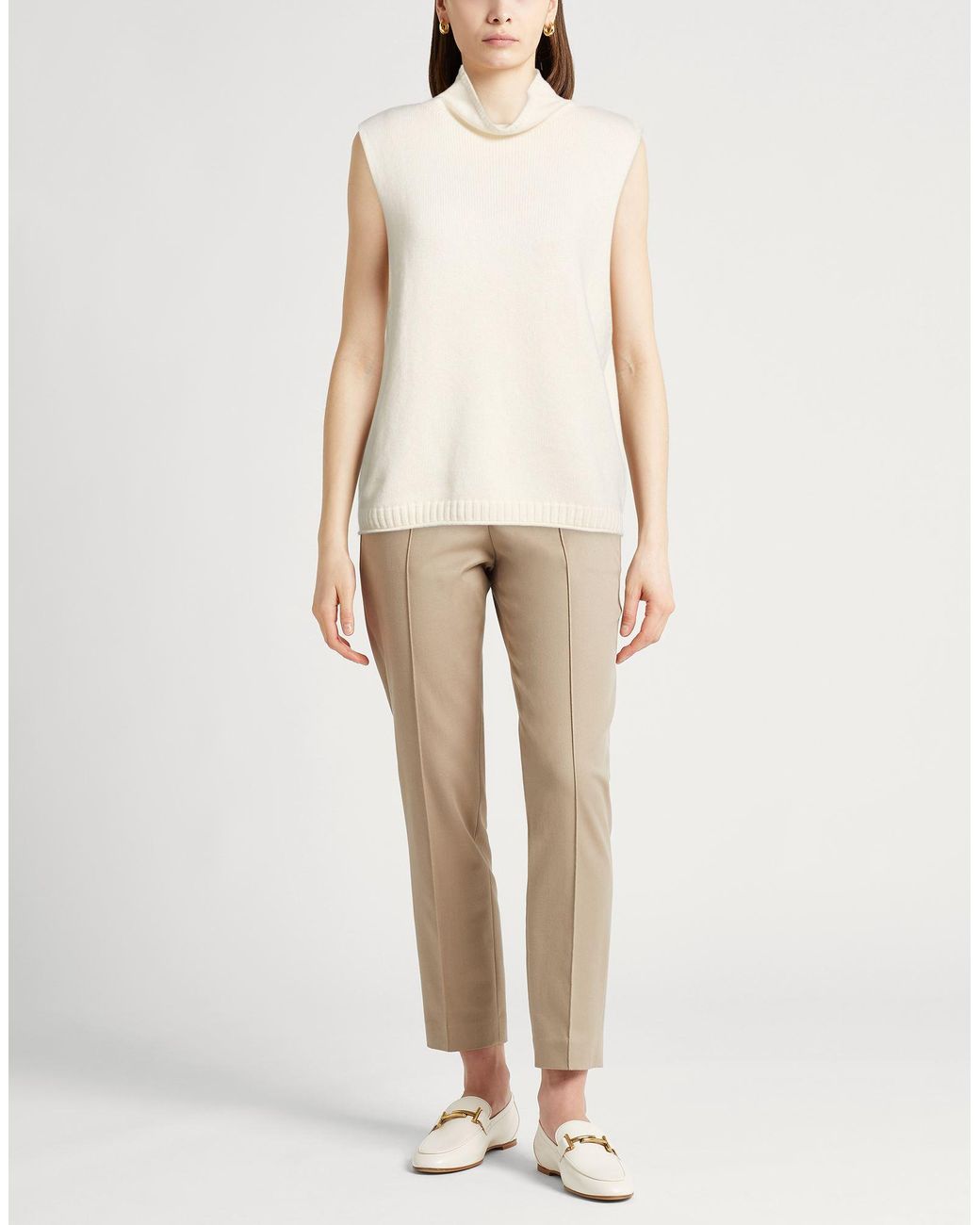 Lisa Yang White Turtlenecks