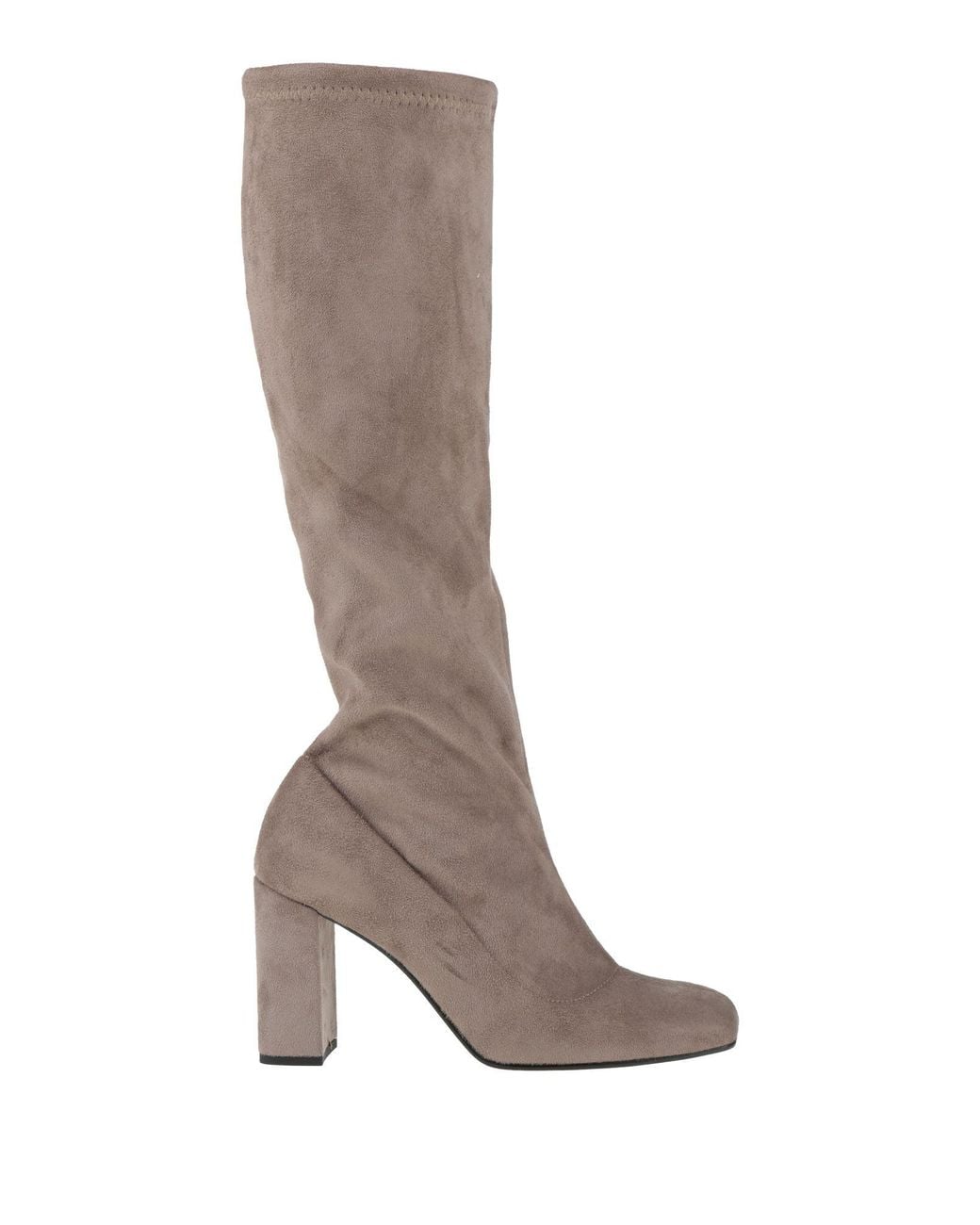 Nila & Nila Brown Boot Textile Fibers