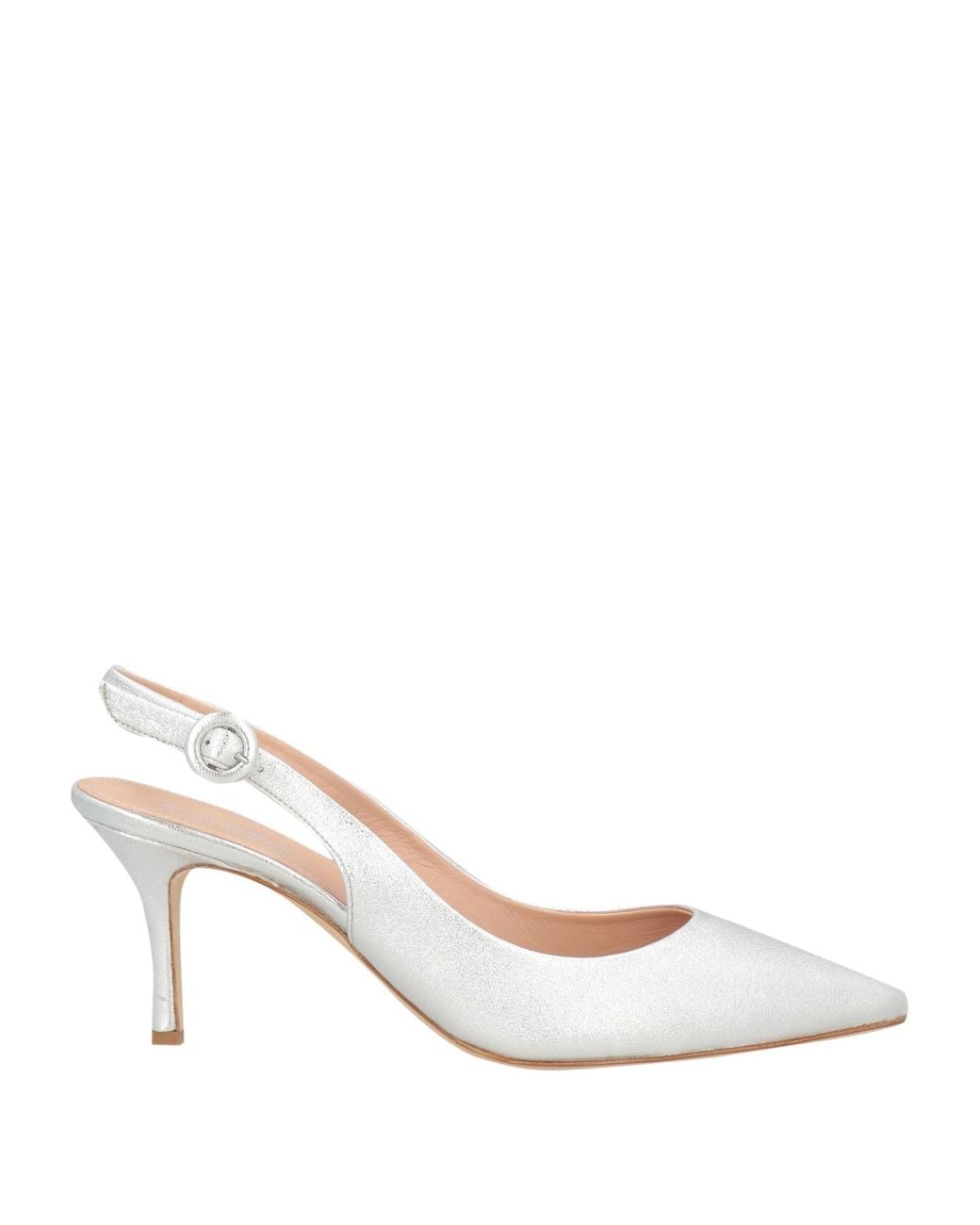 The Seller White Pumps