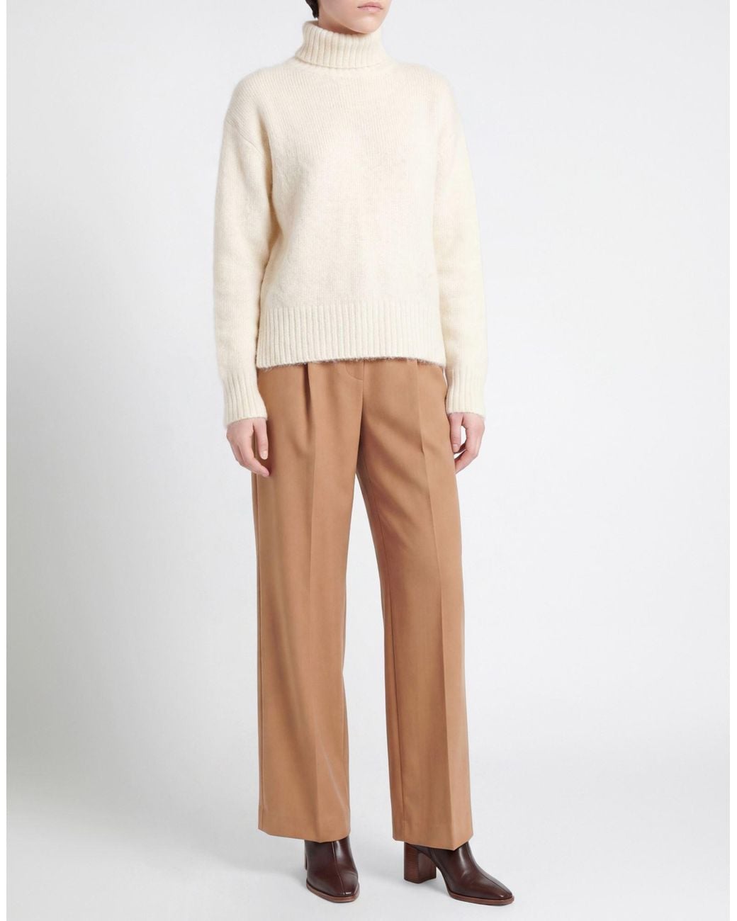 Cruna White Turtlenecks