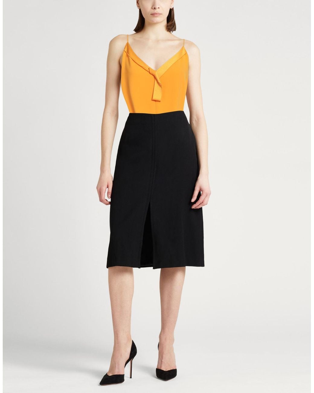 Top Paule Ka de color Orange