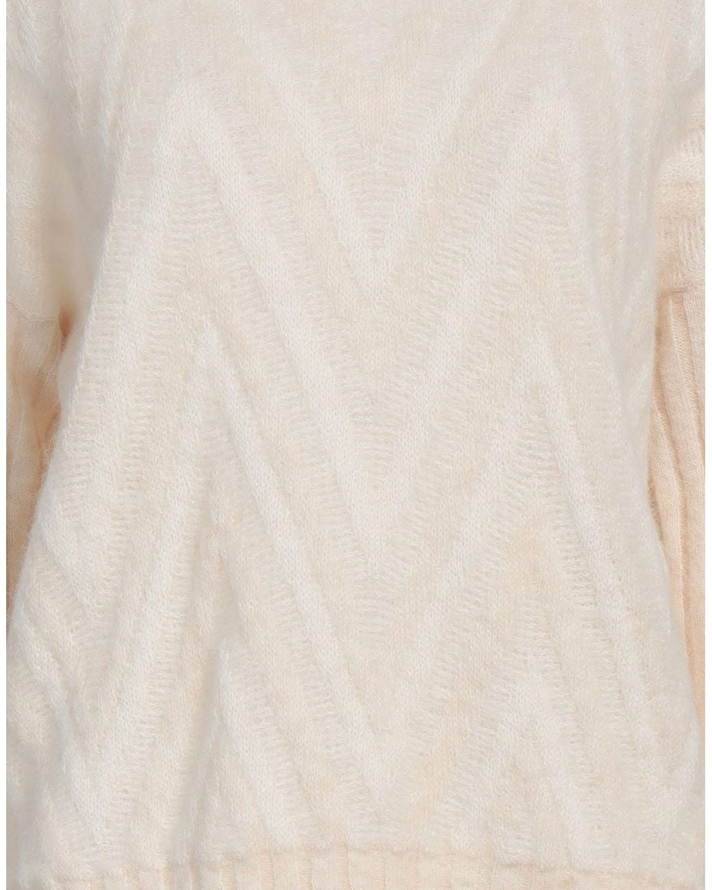 D.exterior White Jumper