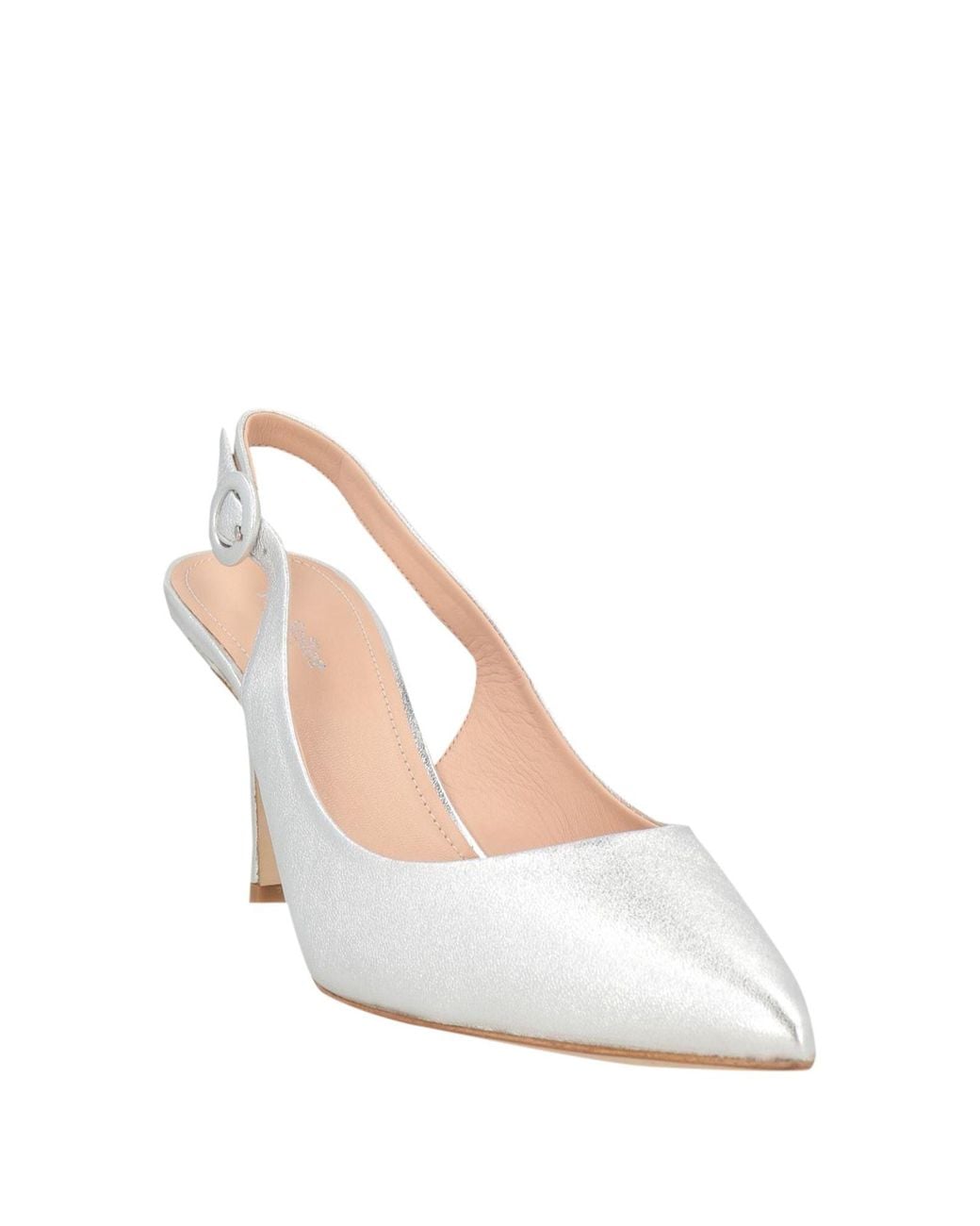 The Seller White Pumps