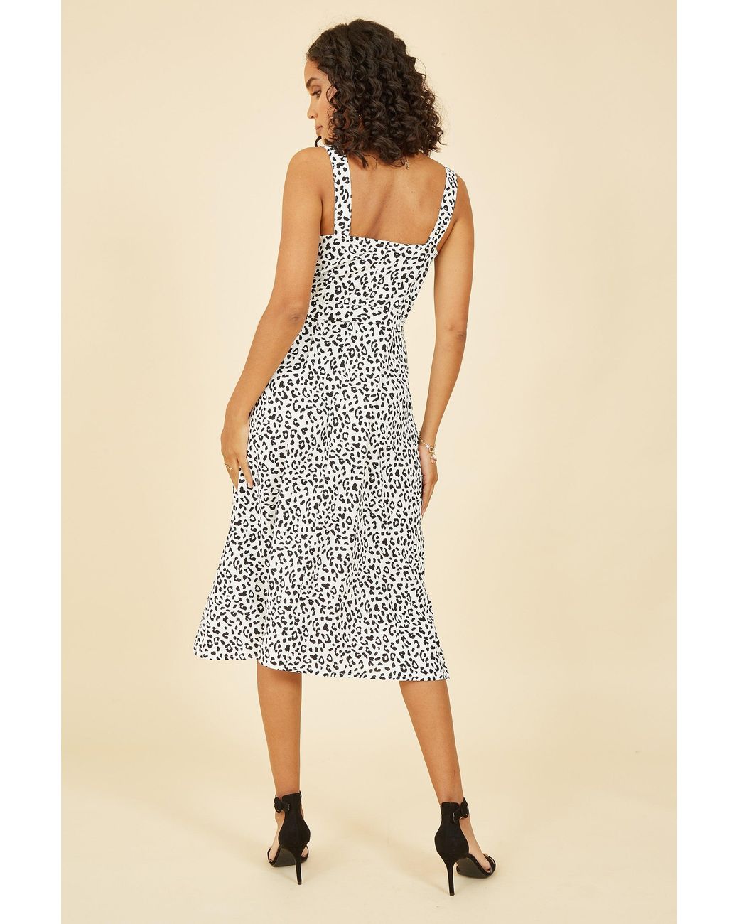 Yumi' White Animal Print Button Up Sundress