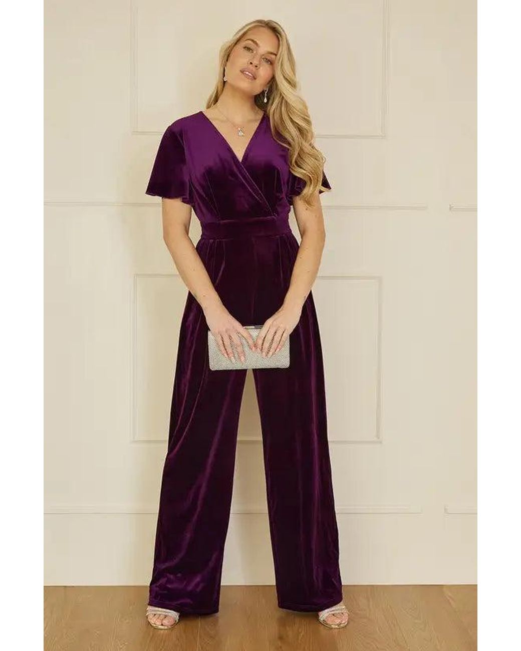 Yumi' Purple Jumpsuit With Angel Sleeves