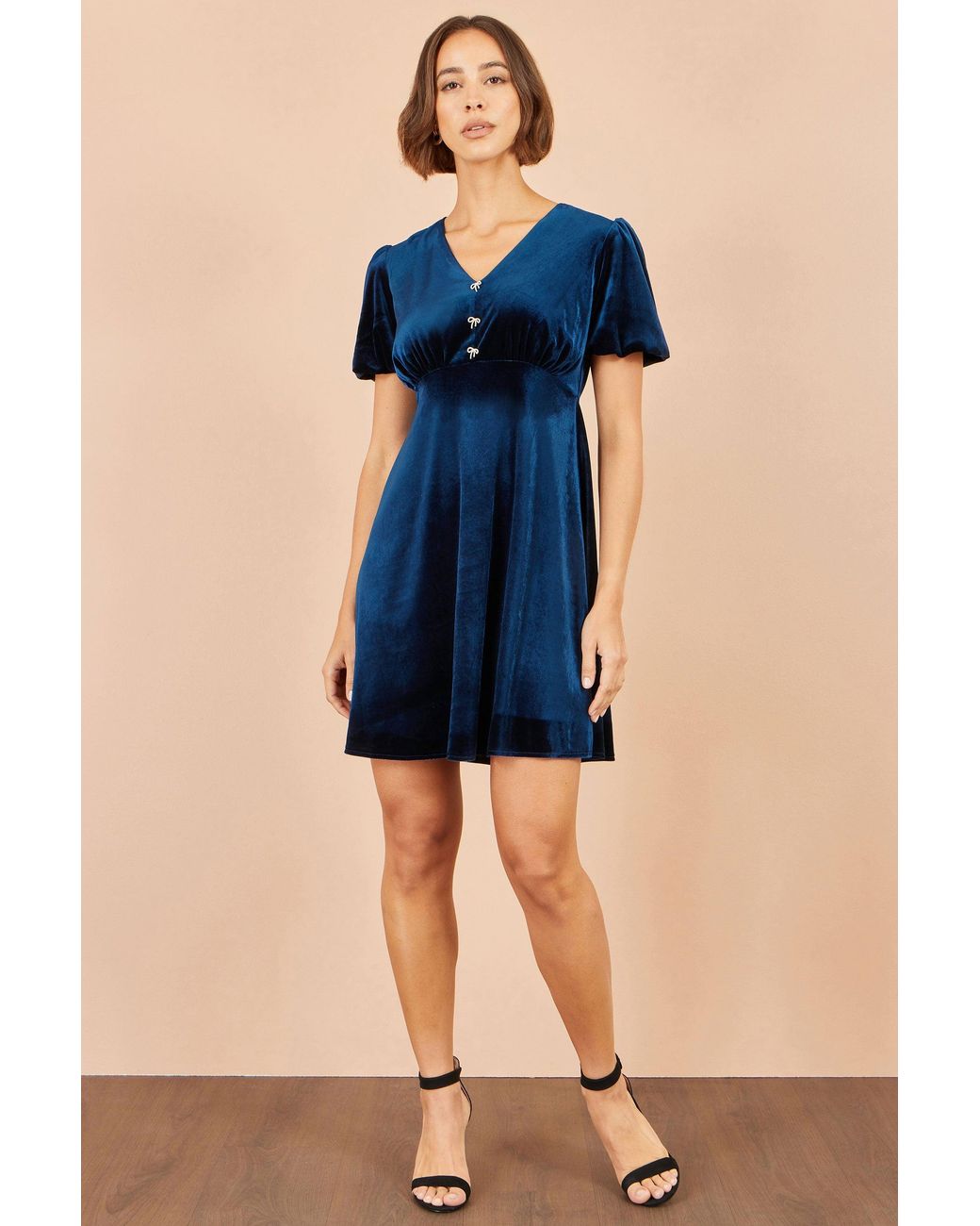 Yumi' Blue Velvet Skater Dress With Dimante Bow Detail