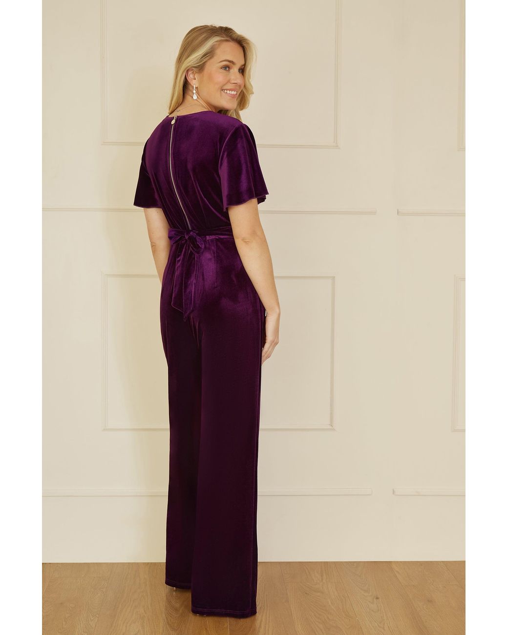 Yumi' Purple Jumpsuit With Angel Sleeves