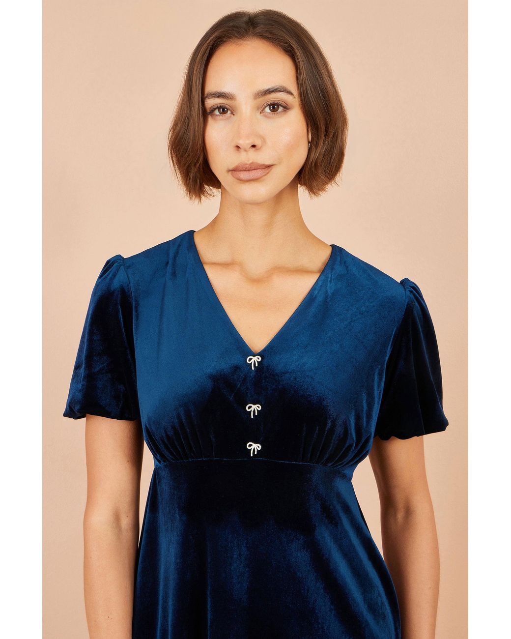Yumi' Blue Velvet Skater Dress With Dimante Bow Detail