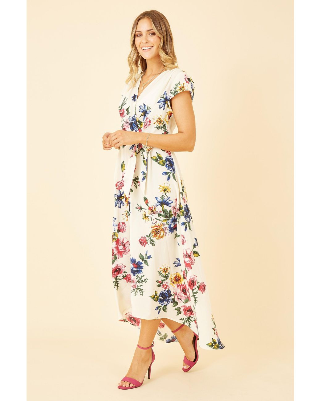 Yumi' Natural Floral Wrap Dip Hem Dress