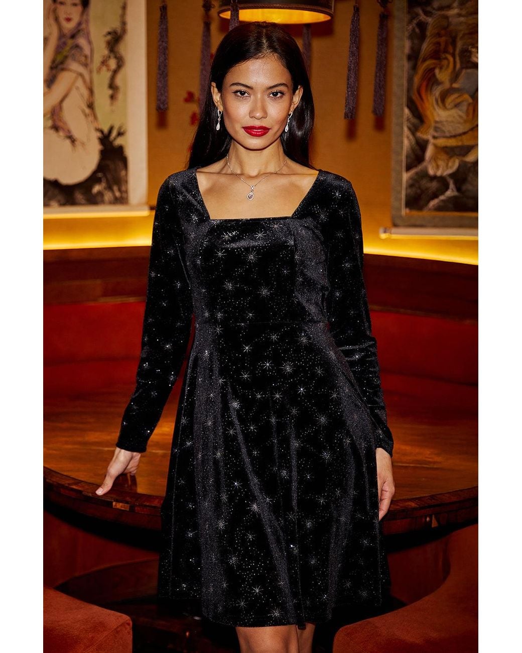 Yumi' Black Starburst Foil Print Long Sleeve Skater Dress