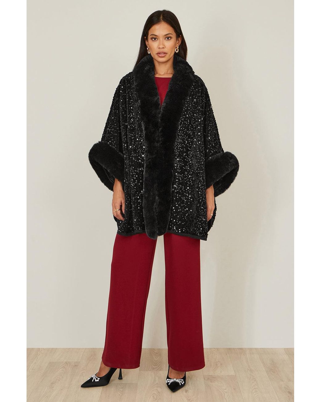 Yumi' Black Sequin Cape With Faux Fur Trim And Lining