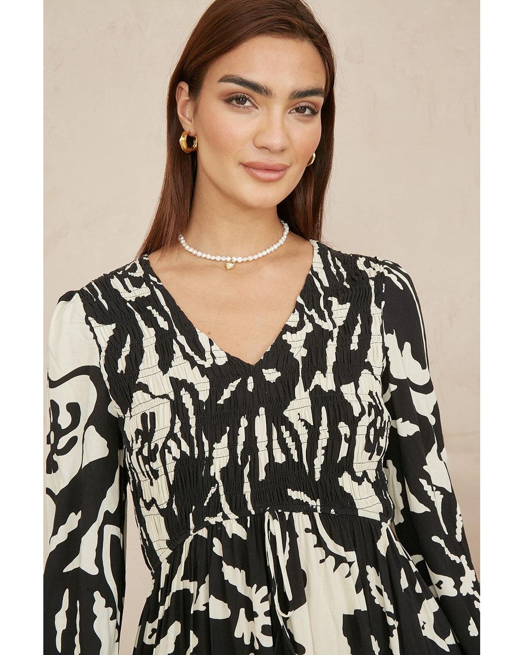 Yumi' Black Abstract Print Ruched Midi Dress With Long Sleeves