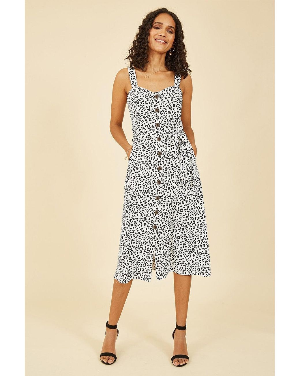 Yumi' White Animal Print Button Up Sundress