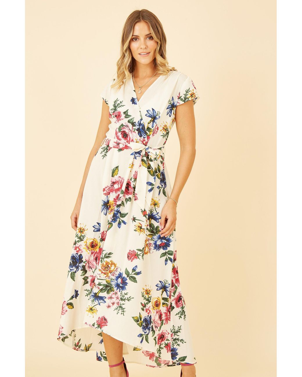 Yumi' Natural Floral Wrap Dip Hem Dress