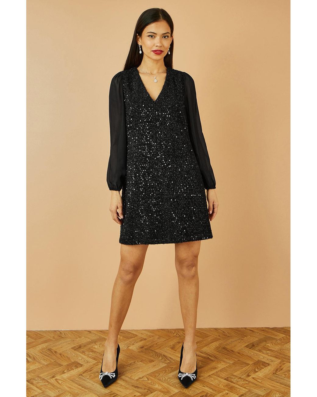 Yumi' Black Sequin Tunic With Tie Back And Sheer Sleeves