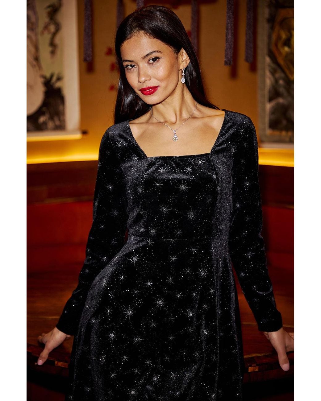 Yumi' Black Starburst Foil Print Long Sleeve Skater Dress