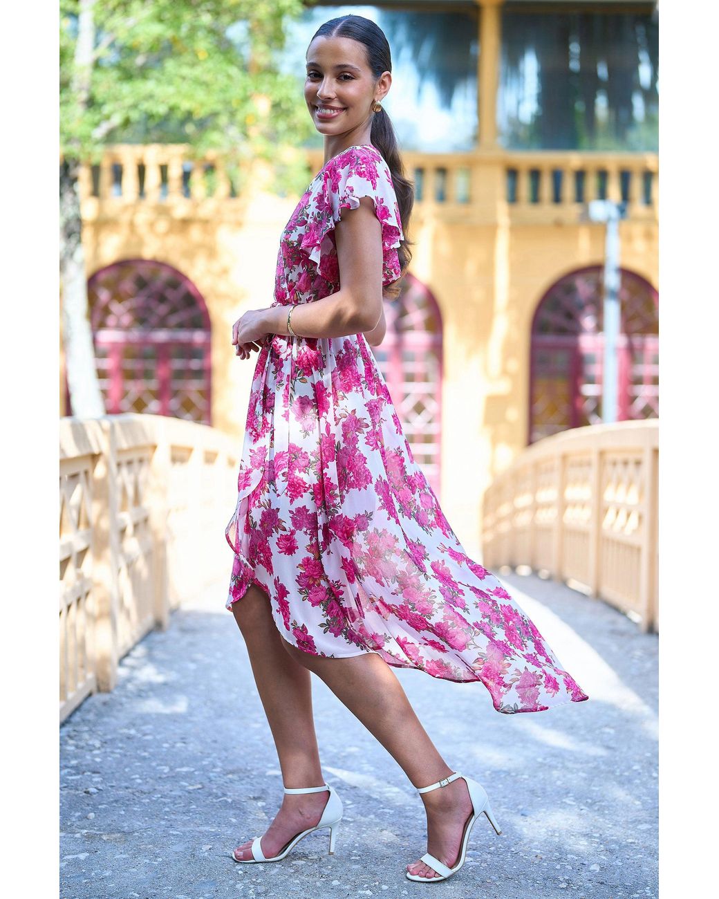 Yumi' Blue Floral Wrap Dress With Dipped Hem