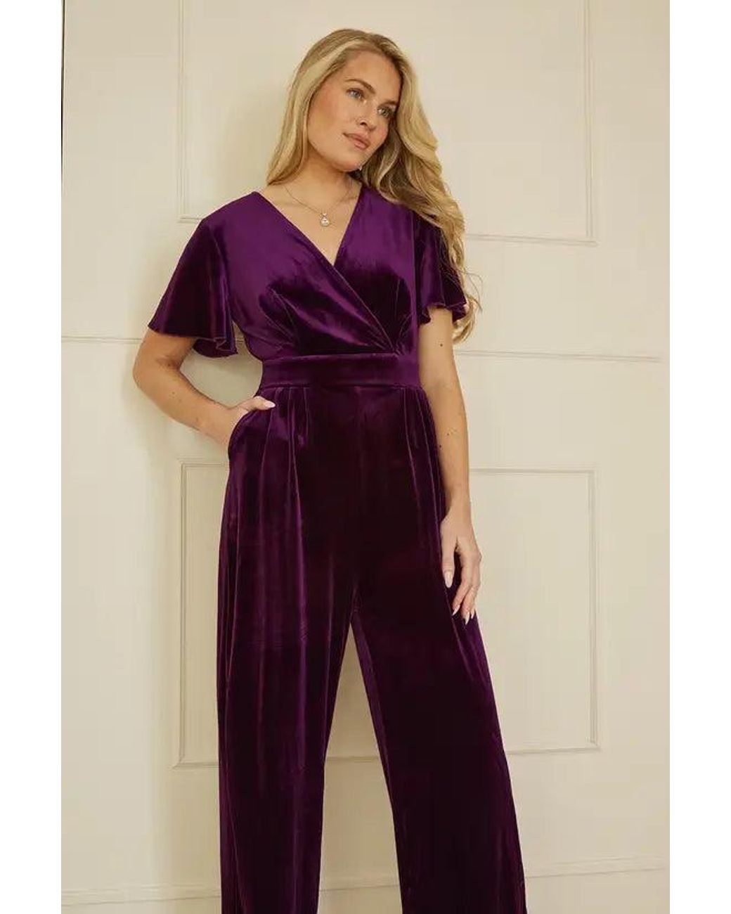 Yumi' Purple Jumpsuit With Angel Sleeves