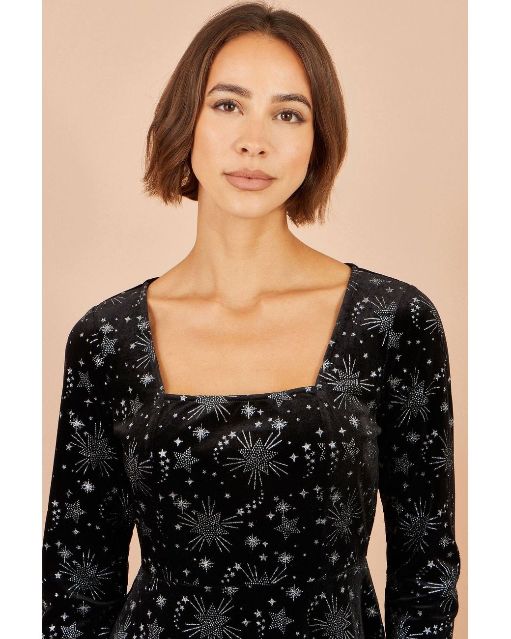 Yumi' Black Starburst Foil Print Long Sleeve Skater Dress