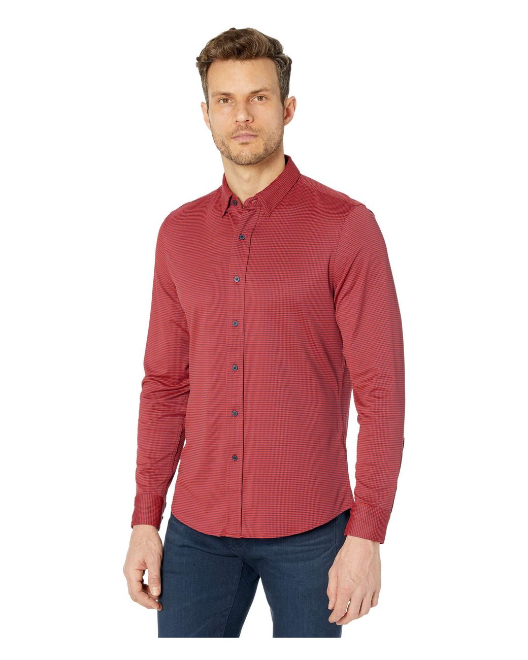 white suit red shirt