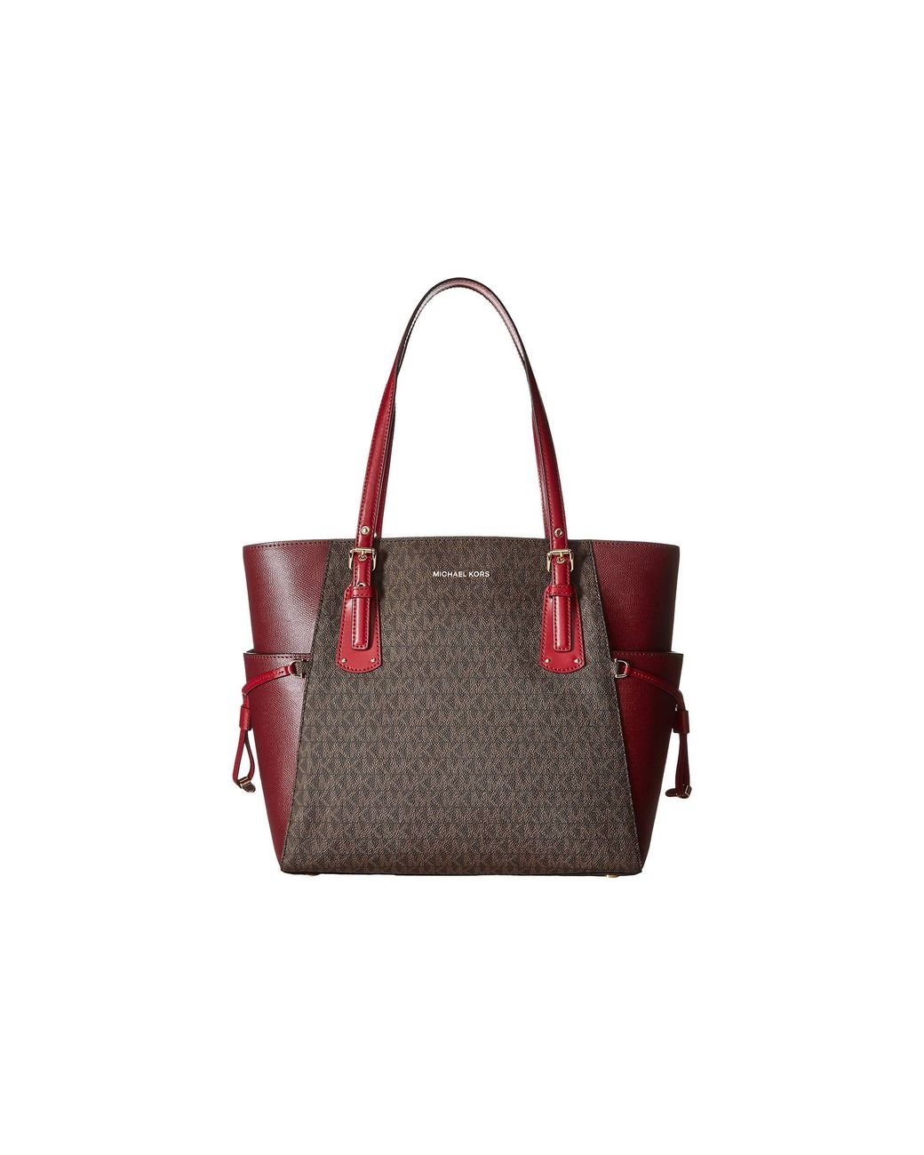 MICHAEL KORS VOYAGER EAST WEST MK SIGNATURE TOTE SHOULDER BAG - CRIMSON RED