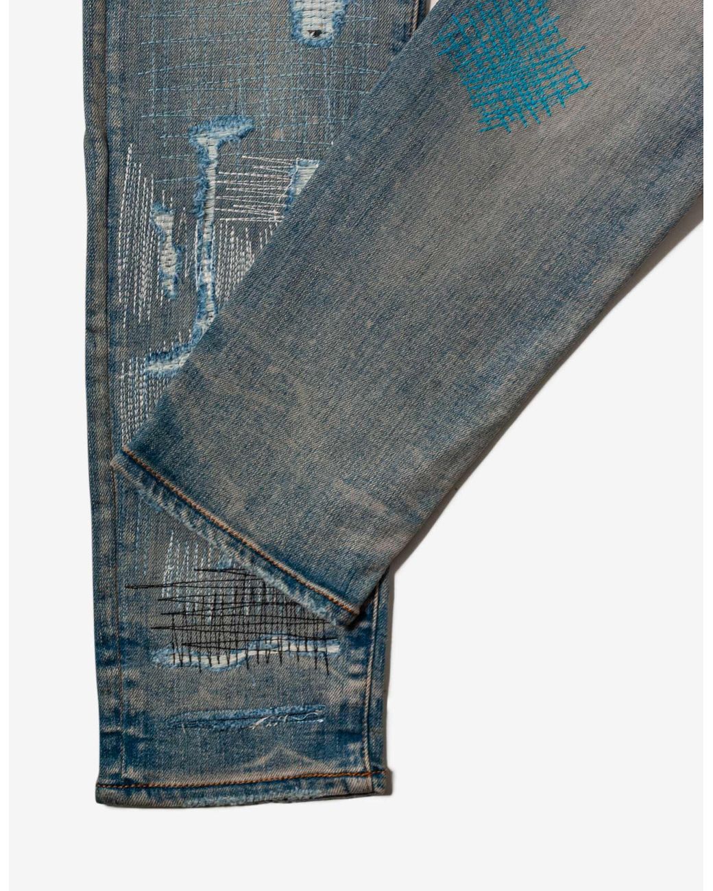 Amiri All Over Repair Clay Indigo Jeans in Blue for Men | Lyst