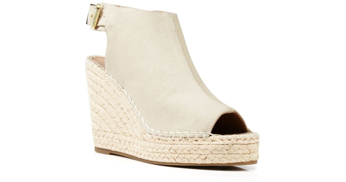cream closed toe wedges