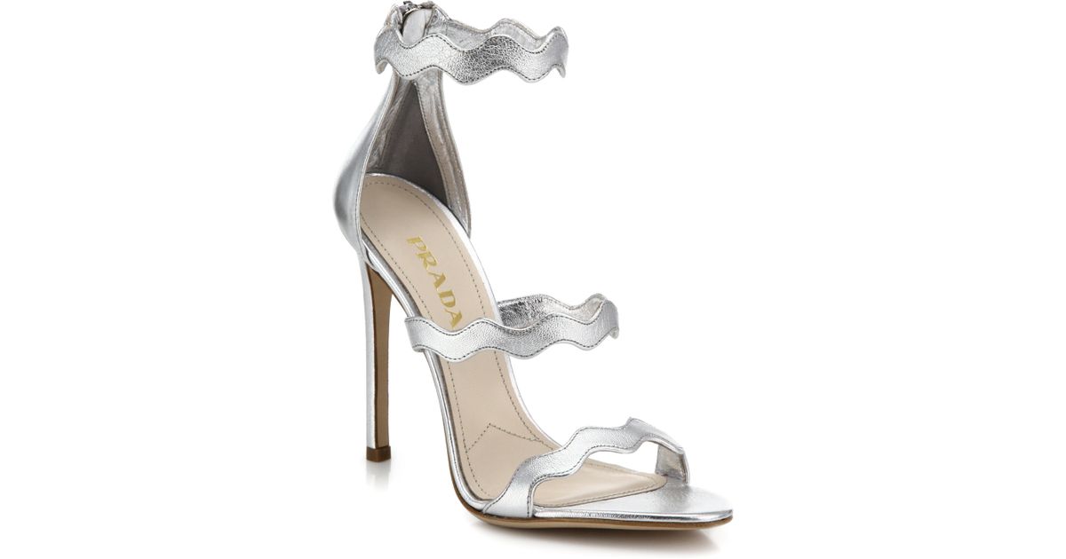 prada scalloped heels gold
