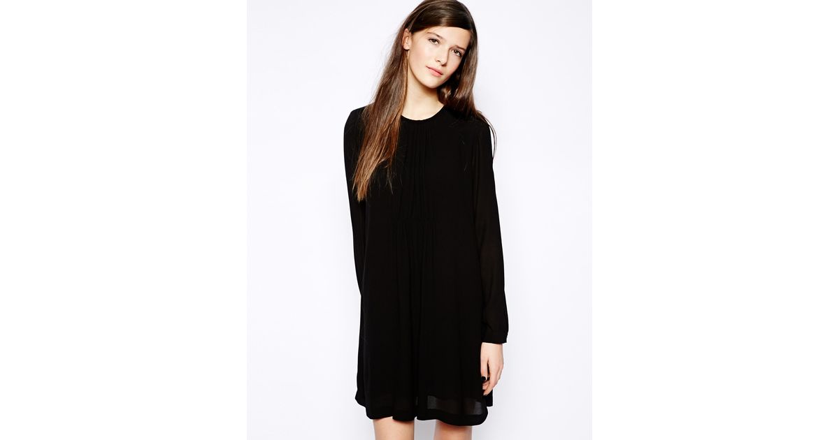 black pleated smock dress
