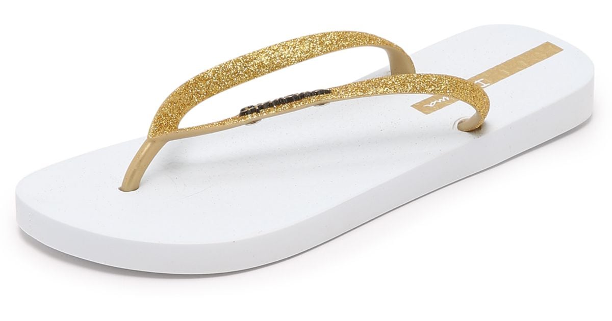 gold glitter flip flops