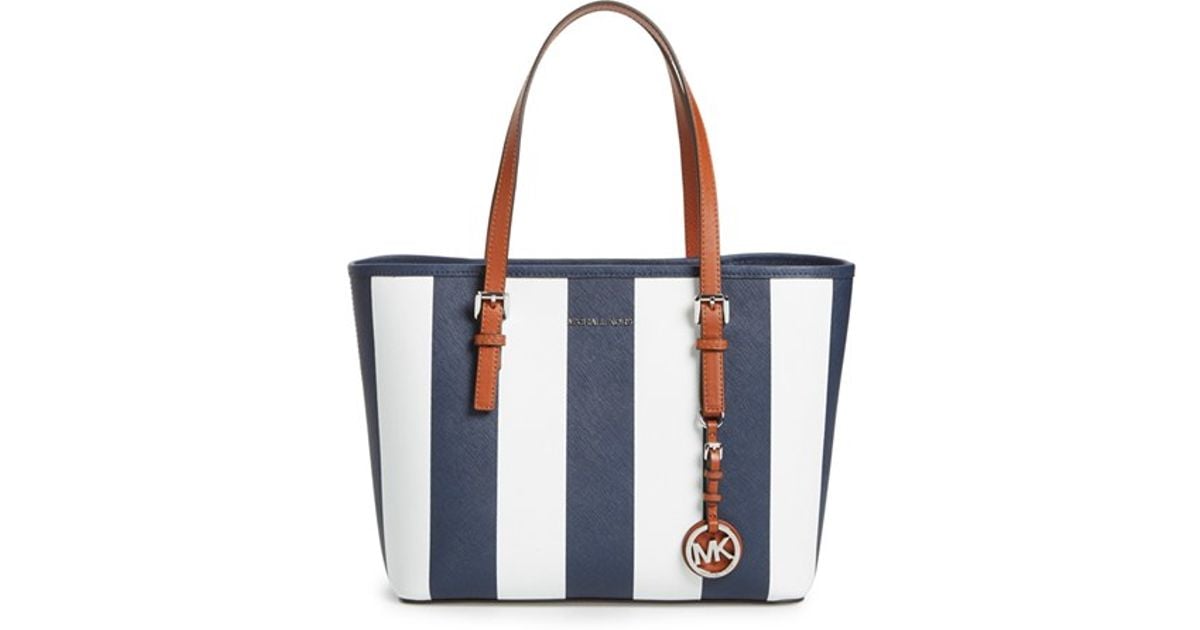 blue and white MK bag