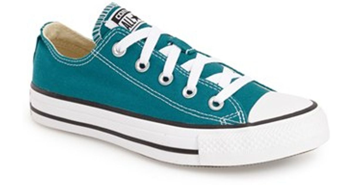 teal colored converse shoes