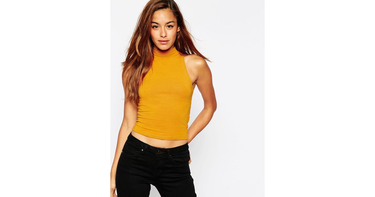 yellow turtleneck crop top