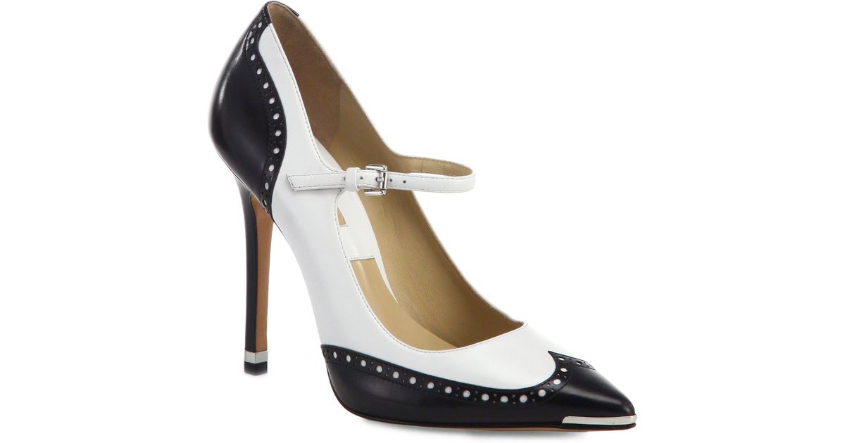 black and white spectator pumps