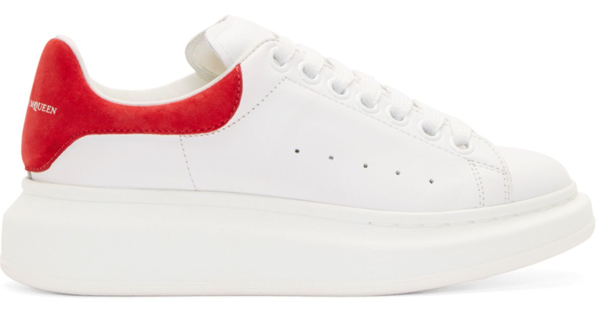 red and white platform sneakers