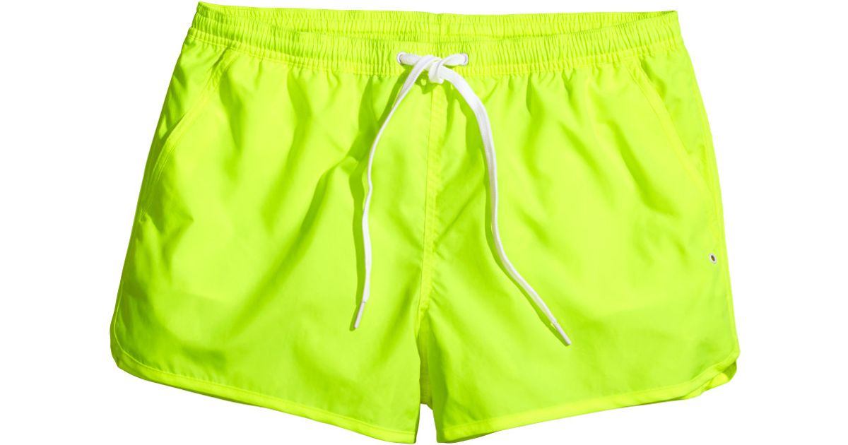 neon green swim trunks
