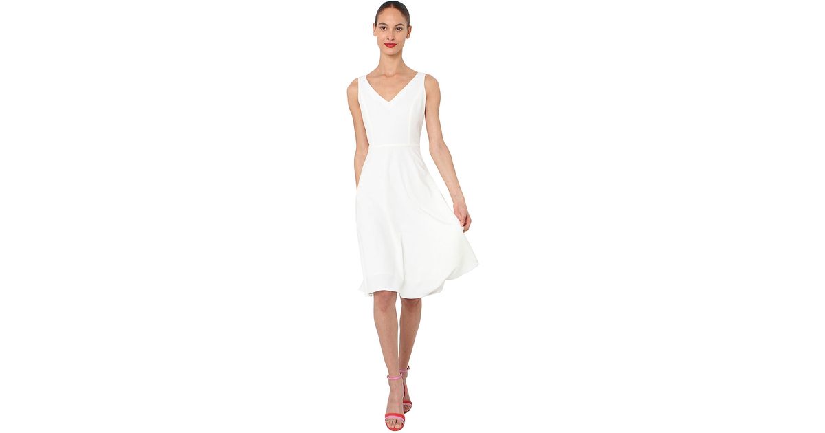 white v neck fit and flare dress