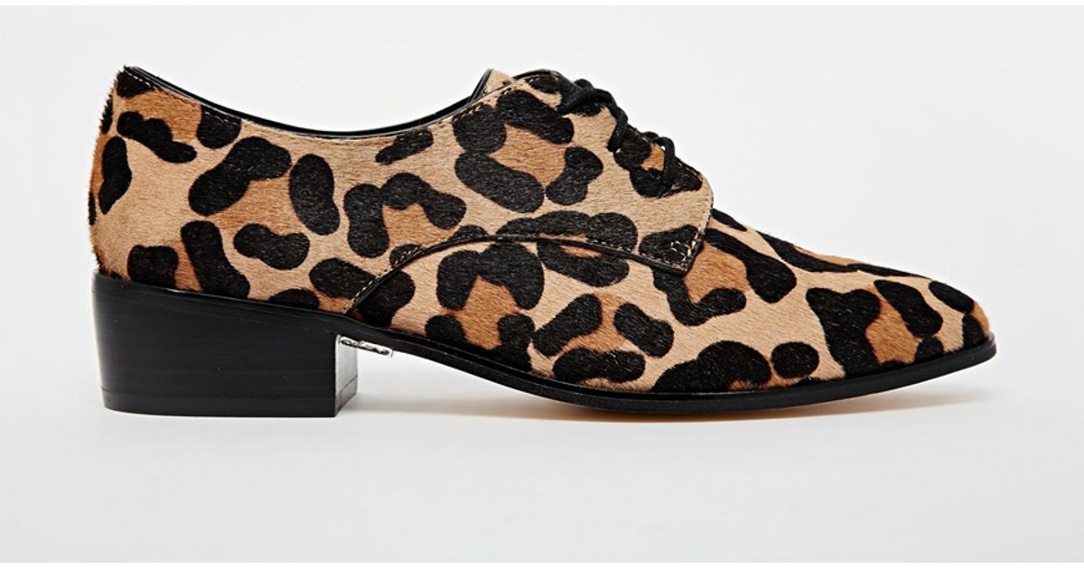 slide sneakers with leopard print pony skin inserts