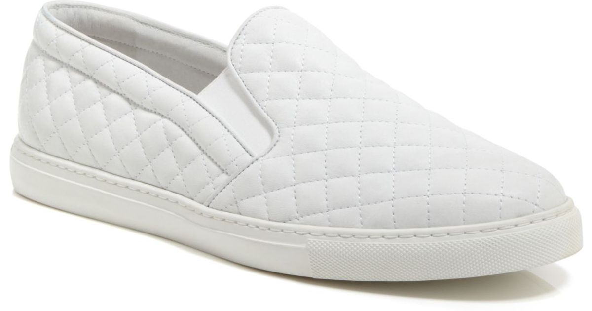 white quilted slip on sneakers